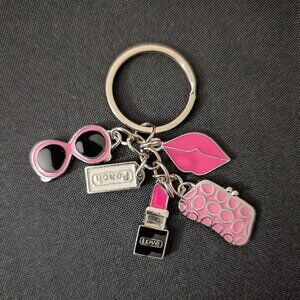 Silver toned pink purse charm keychain